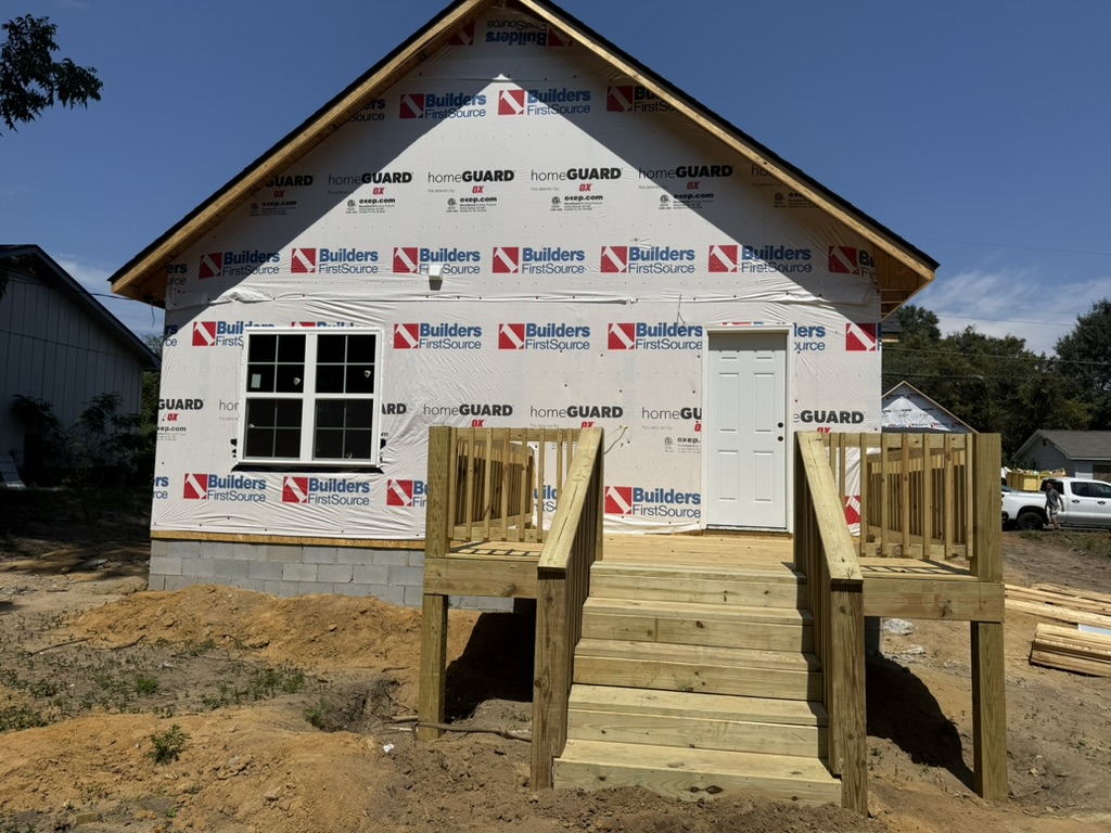 Affordable housing home exterior and front porch under construction in Macon-Bibb County